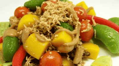 Thai Mango Salad with Spicy Peanut Dressing Toasted Coconut